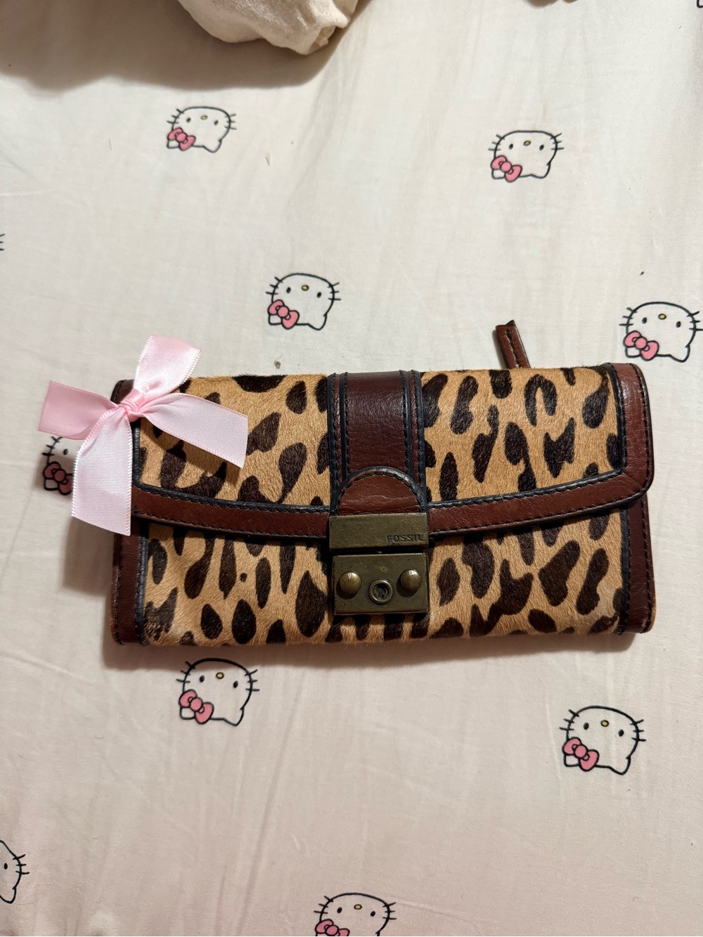 Fossil Leopard Print Wallet with Brown Trim and Pink Bow